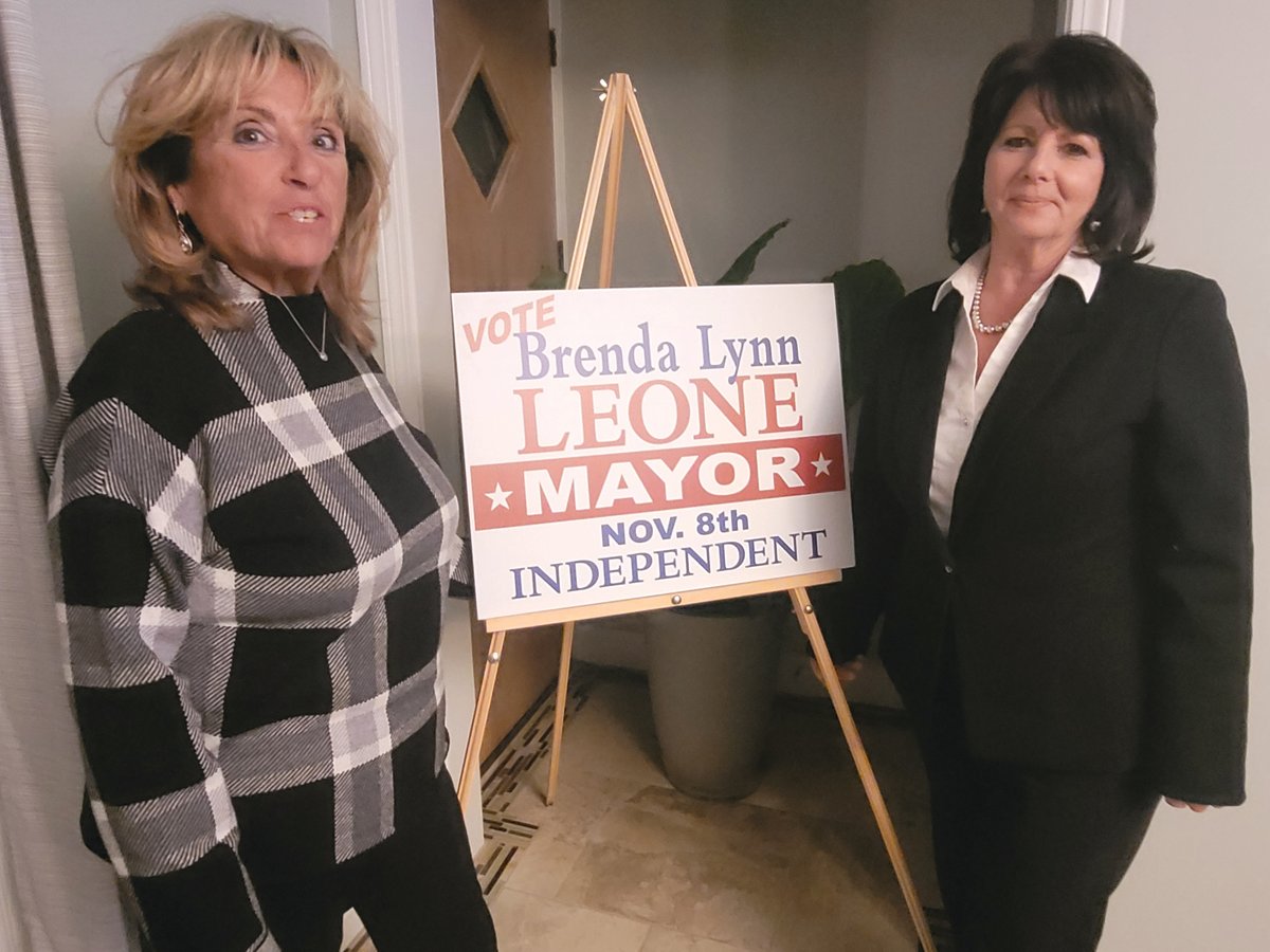 THE OPPOSITION: Brenda Lynn Leone waited with campaign supporters at her General Election headquarters in the Berkshire Hathaway Real Estate Office at 1251 Atwood Ave., Johnston. She posed for a photo with campaign manager Debbie Spaur.